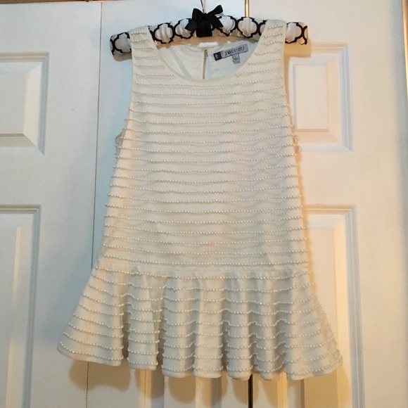 Jennifer Lopez embellished mesh peplum top