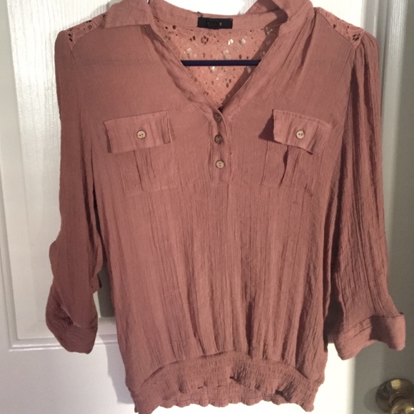 Button down shirt, lace in back, elastic on bottom