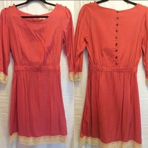 Vintage style, pretty in pink dress with lace trim