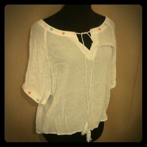 En Creme Hi Low Crop! Funky Back!🌷