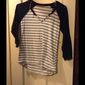 Baseball style black and white striped top