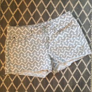 GAP grey and white tribal cut-off shorts