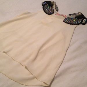 Cream camisole with embellished sleeves