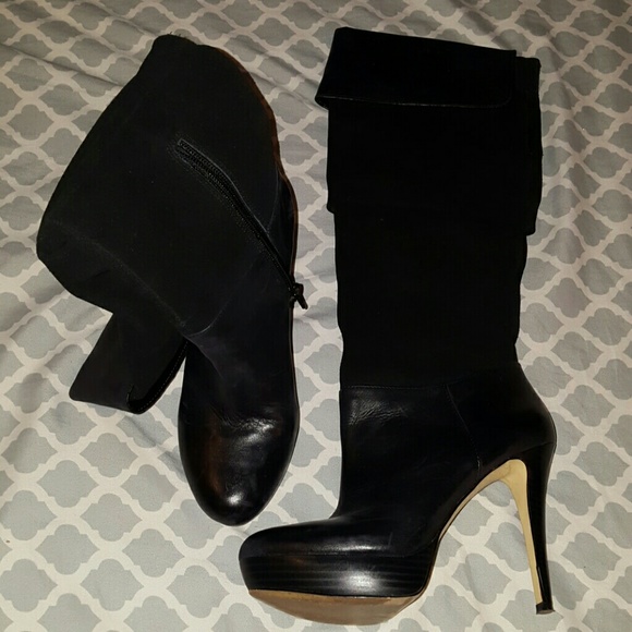 Knee high black high heel boots