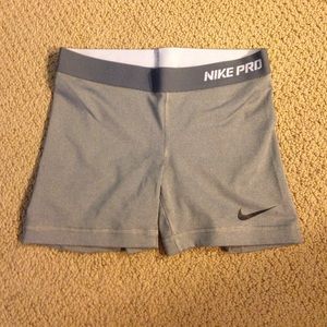 Never worn/washed Nike pros; size small; gray/grey