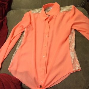 salmon colored button up blouse. worn a few times