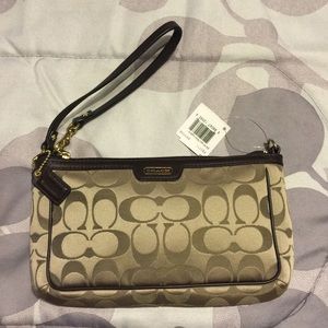 Coach Wristlet bag.