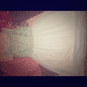 I am selling a beautiful xhilaration dress