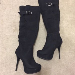 Black suede high heeled boots