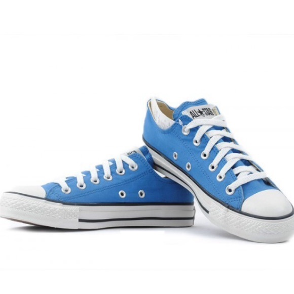 Blue converse with white shoe laces