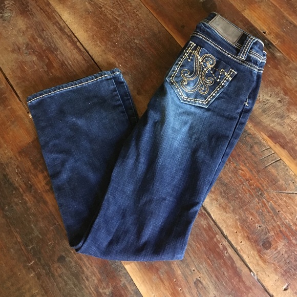 Never worn cowgirl up jeans 28/32 in size