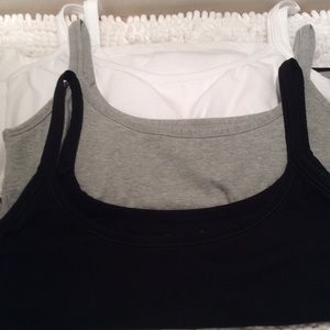 Three undershirts with shelf bra