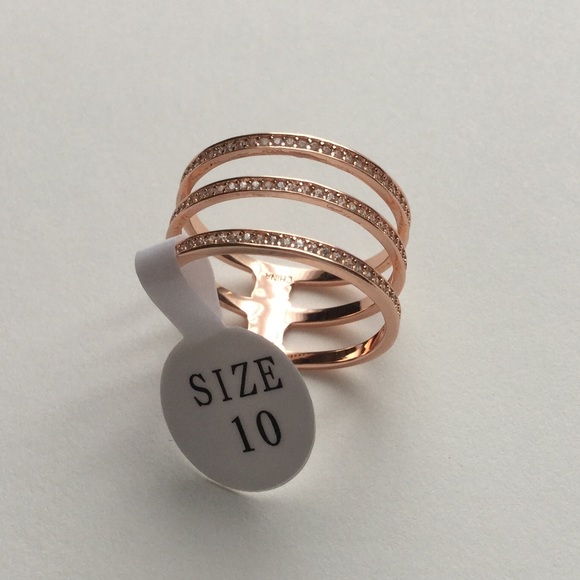 Rose gold and cubic zirconia triple set ring
