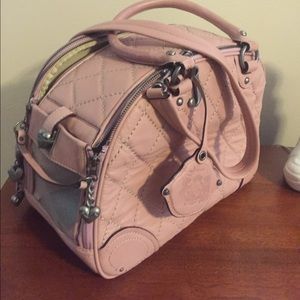 Juicy couture dog carrier pink.