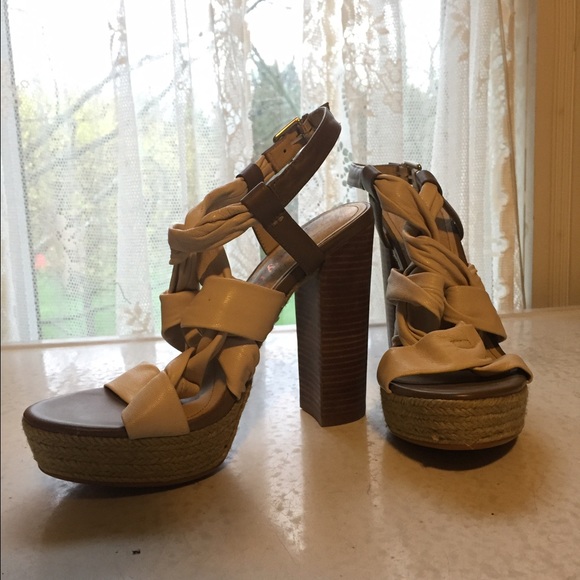 Tan leather wrap heel.