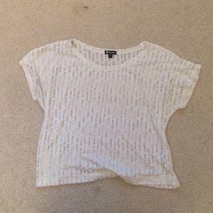 Short sleeved shirt with slits in it.