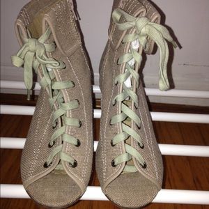 Seriously cute peep toe wedge booties.