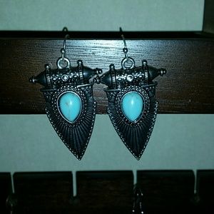 NWOT buckle earrings.