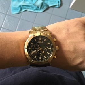 Gold invicta watch