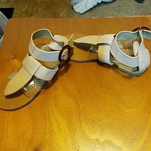 Nude strappy sandals.