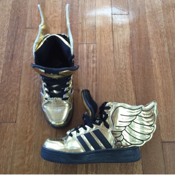 Adidas gold wing limited edition shoes.