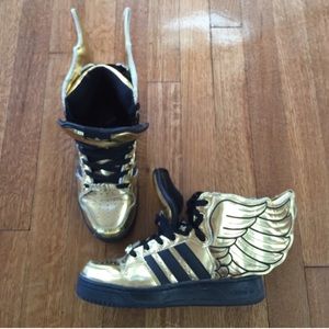 Adidas gold wing limited edition shoes.