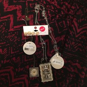 Two necklaces, and two pair of free earrings.