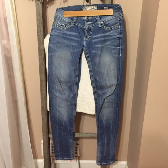 Buckle Skinny Jeans
