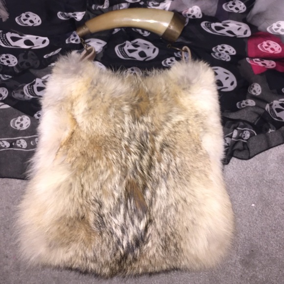 Unique fur shoulder bag with horn handle