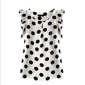 White blouse with polka dots