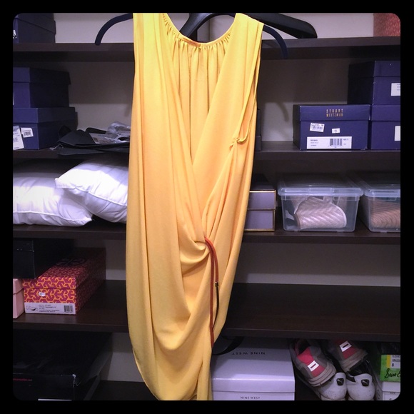 Yellow criss cross dress with orange belt