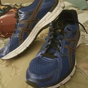 Navy with orange trip ASICS tennis shoes