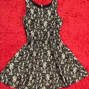 Elegant Black and Nude Lace Dress