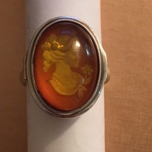 Silver ring with carved Amber