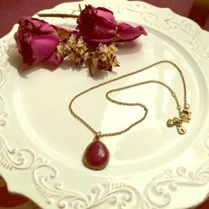 Fossil wine stone pendant