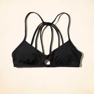Black hollster swimsuit top with design on back