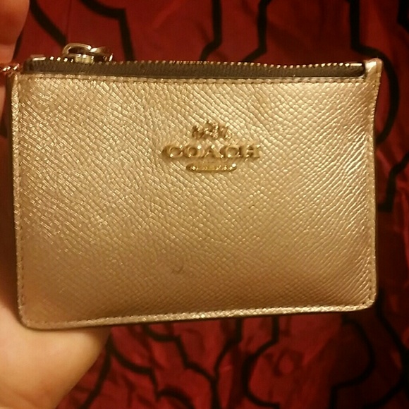 Coach card/change holder keychain.