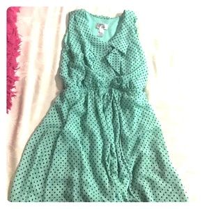 Teal polkadot dress.
