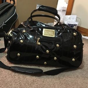 Black Betsyville by Betsy Johnson travel bag.
