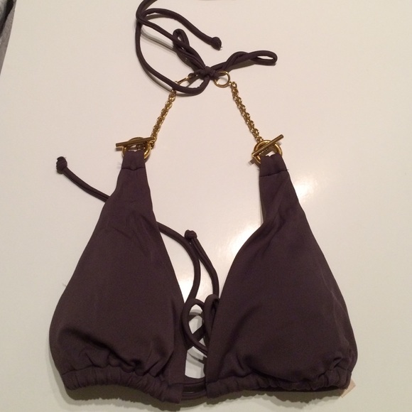 Chocolate halter top with hardware.