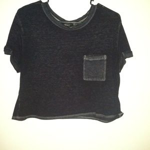 A blackish grey crop top