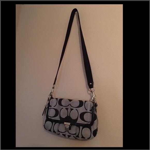 Black&grey w/ silver lining coach crossbody bag.
