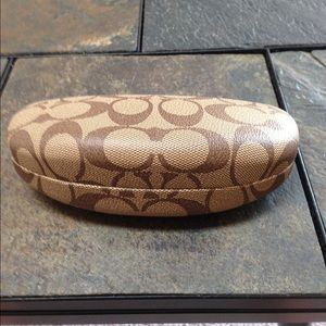 Authentic Coach glasses case.