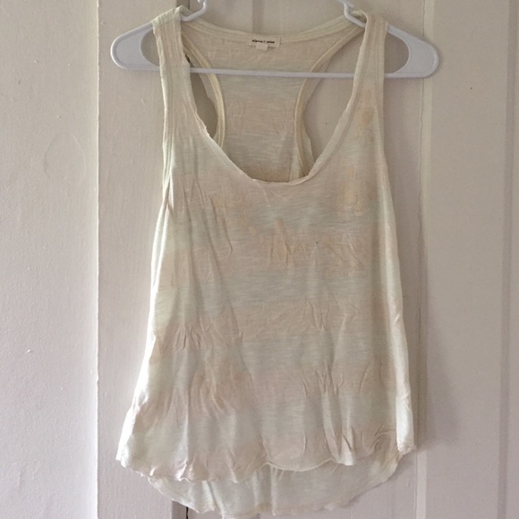 White and tan small tank top.