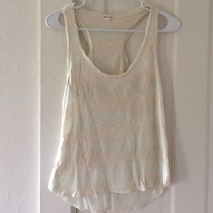 White and tan small tank top.