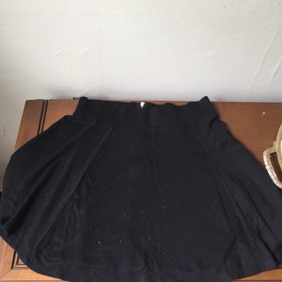 Black free flowing skirt.