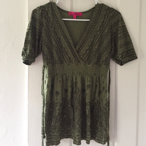Green and brown detailed shirt.