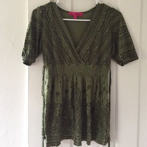 Green and brown detailed shirt.