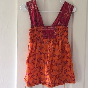 Super bright colored orange and pink top.