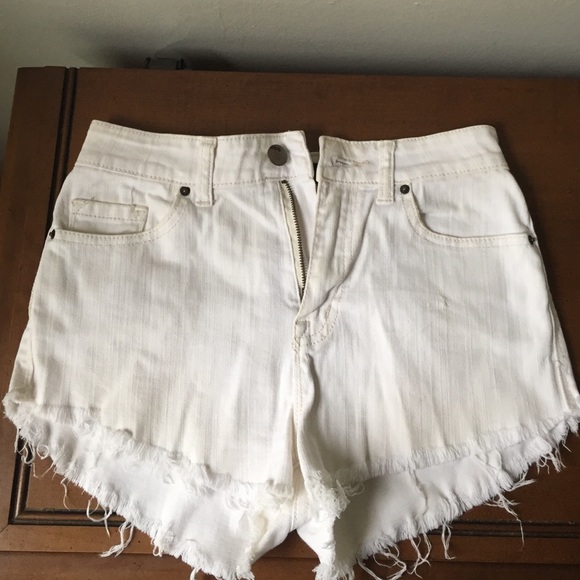 White high waisted Jean cut off shorts.